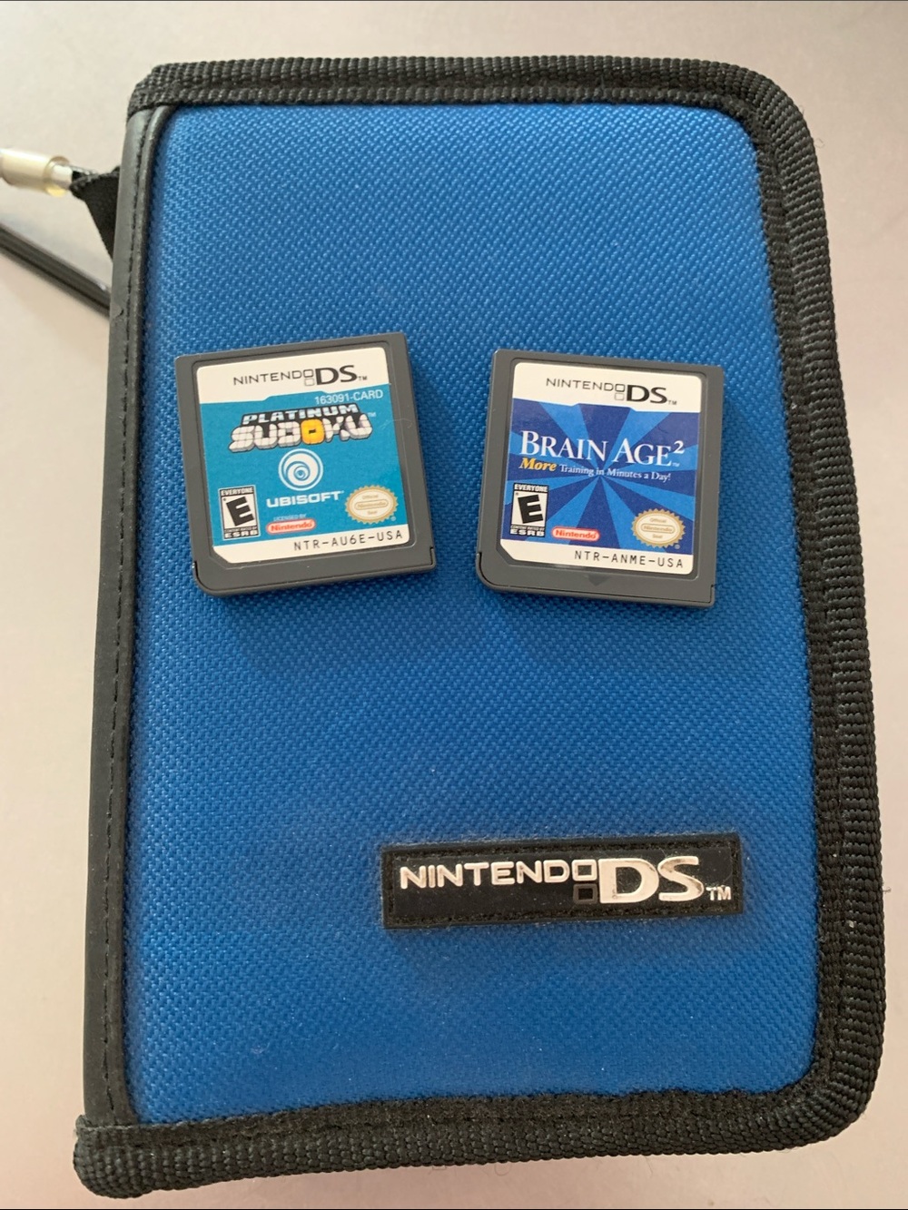 Vintage Nintendo DS case with two games - brain age 2 & platinum sudoku